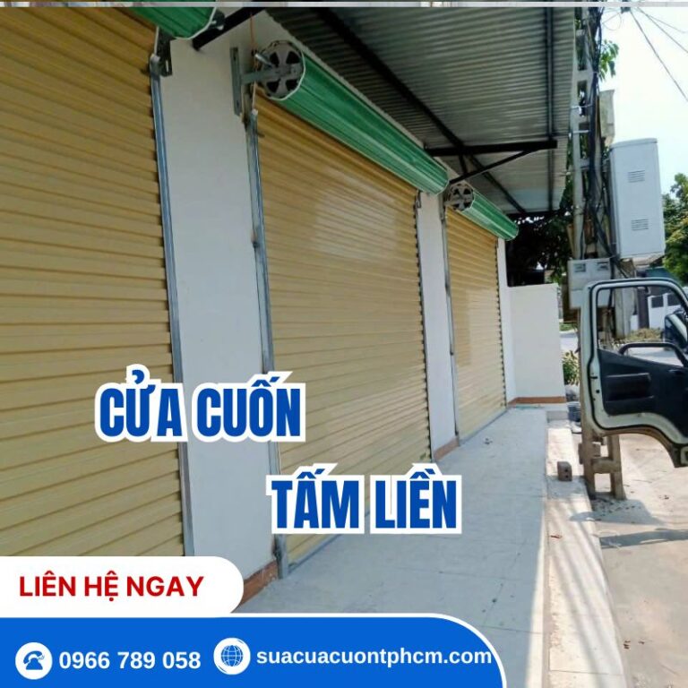 Thi công cửa cuốn tấm liền công nghệ Úc màu vàng kem cho mặt tiền cửa hàng